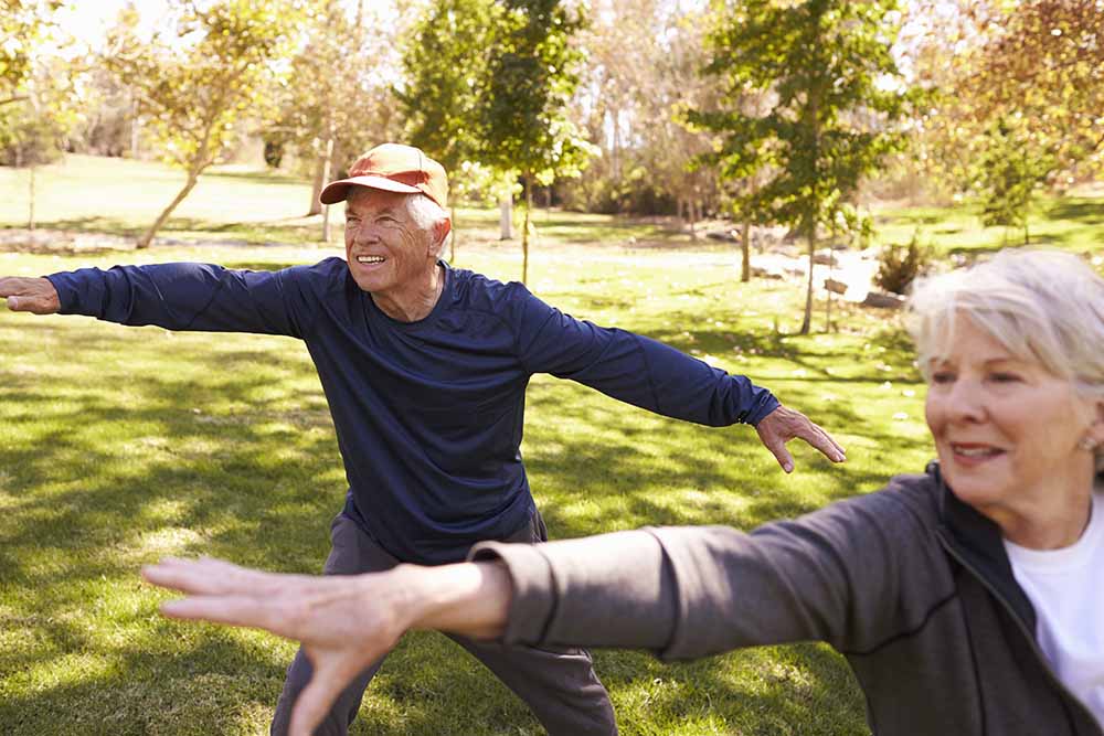 Aging adults practicing Tai Chi