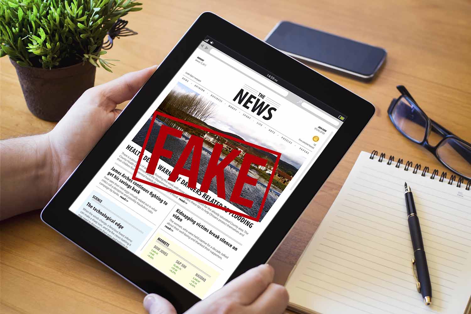 desktop tablet fake news 1500 x 1000