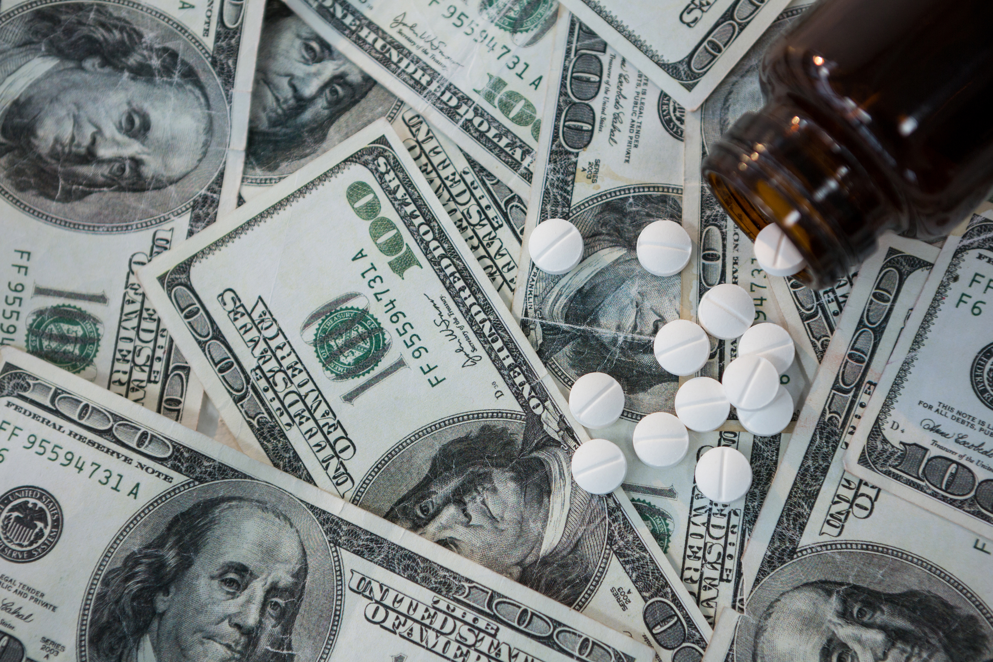 American money and pills drug pricing