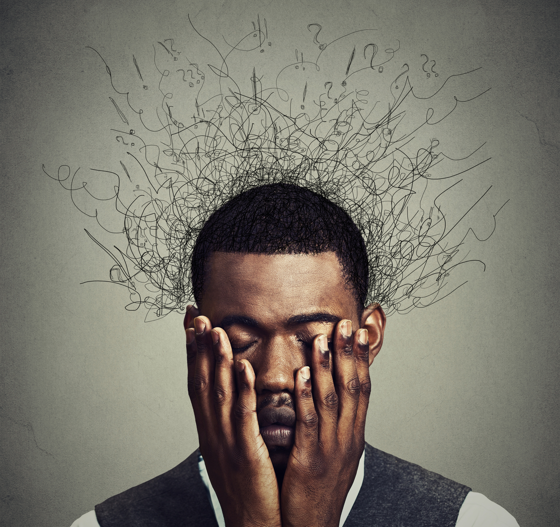 Depressed worried young man with worried desperate stressed expression hands covering face and brain melting into lines question marks. Depression, anxiety disorders, life failure. Gray background 1786 x 1679