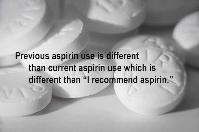 Macro shot of white asprin on white background with Robin text on top 650 x 432