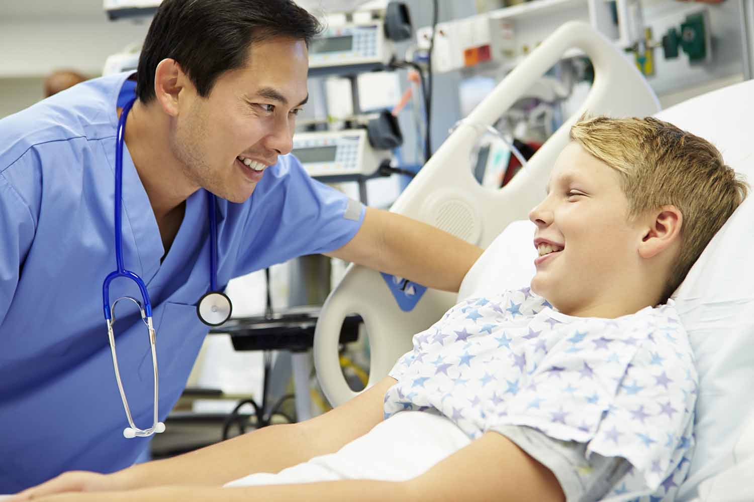 Boy Talking To Male Nurse In Emergency Room 1500 x 1000