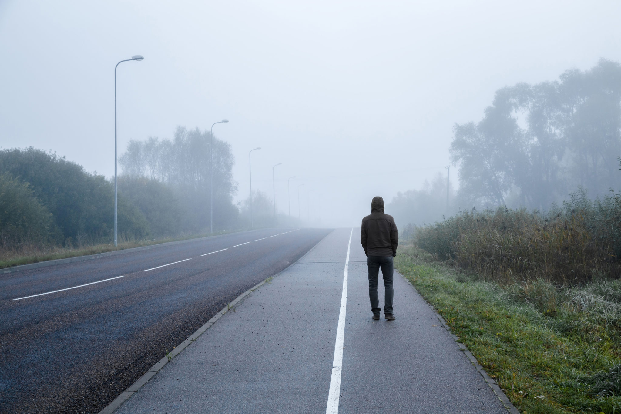 permission-young man foggy road