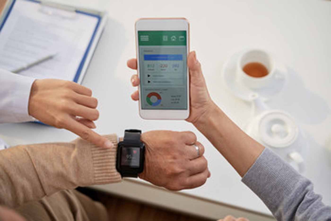 Patient with smart watch measuring vital signs IoT for seniors