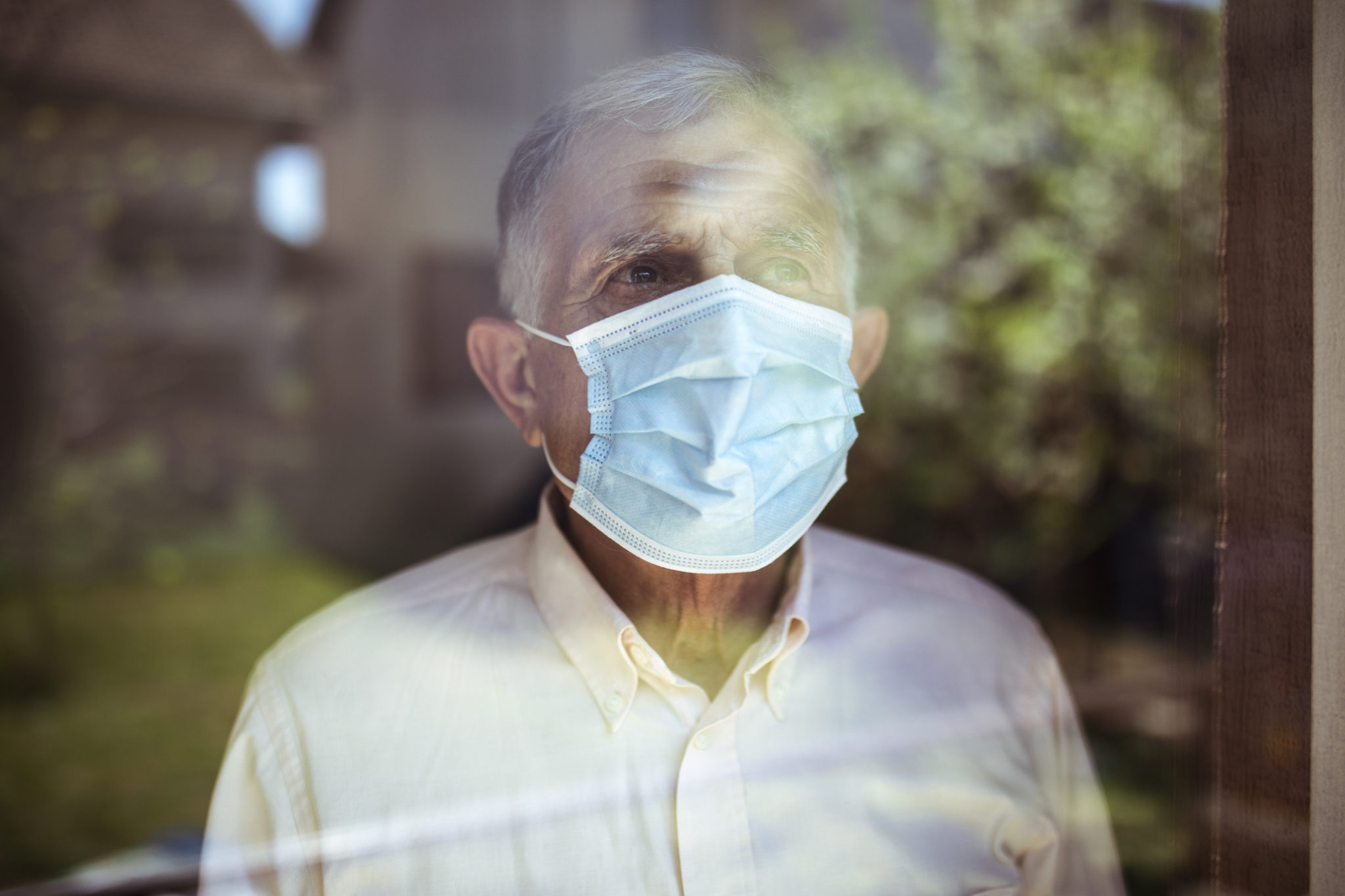 fear of covid senior man in face mask