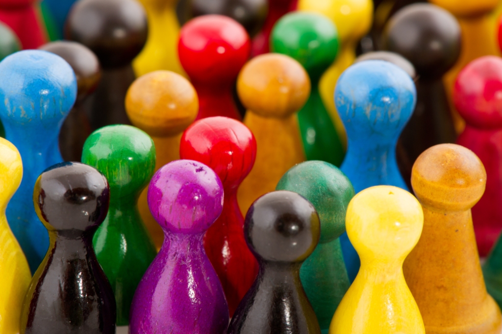 brightly colored pawn pieces 1024 x 683