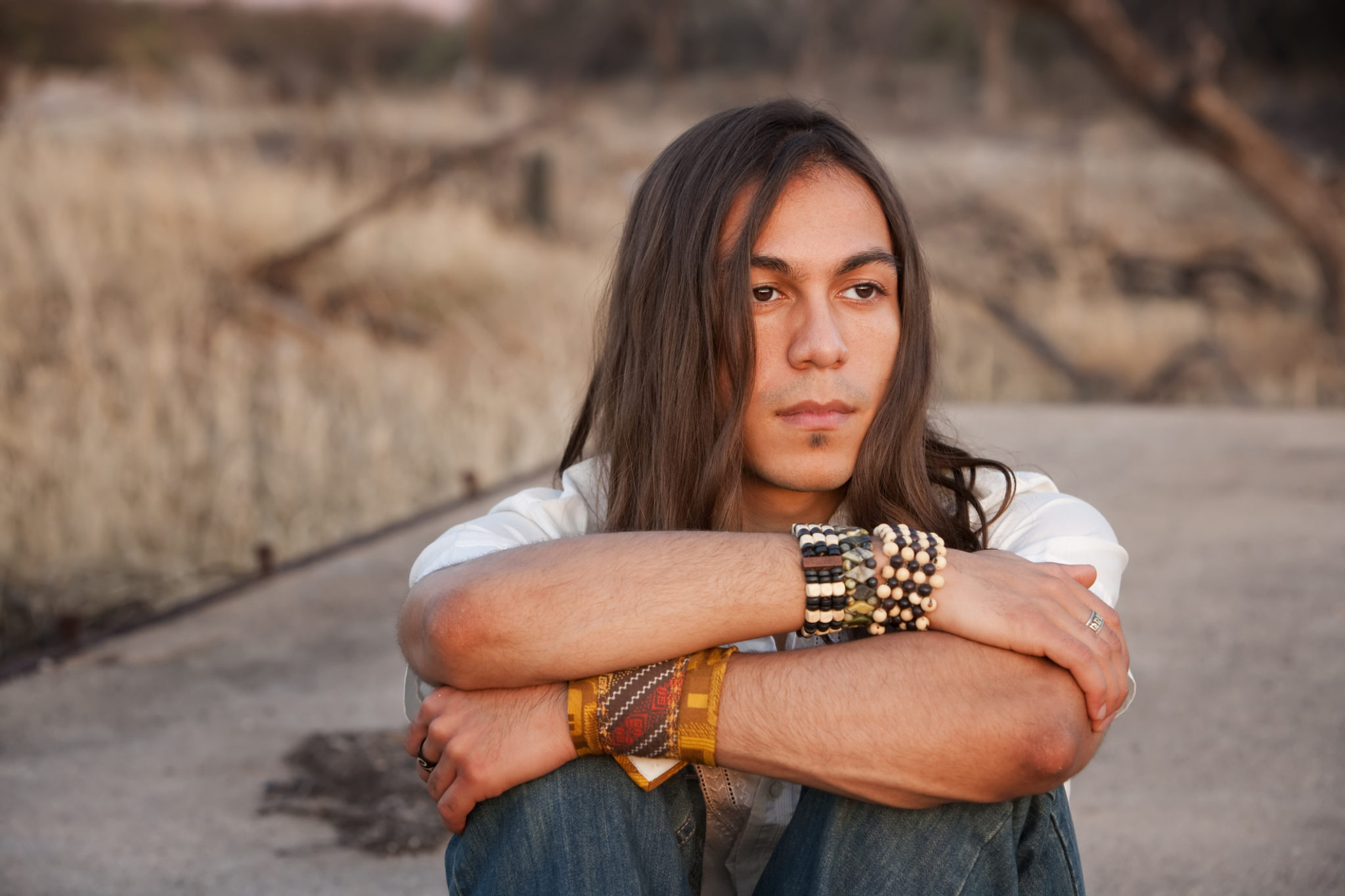 Young native american man with decorative bracelets 2290 x 1526