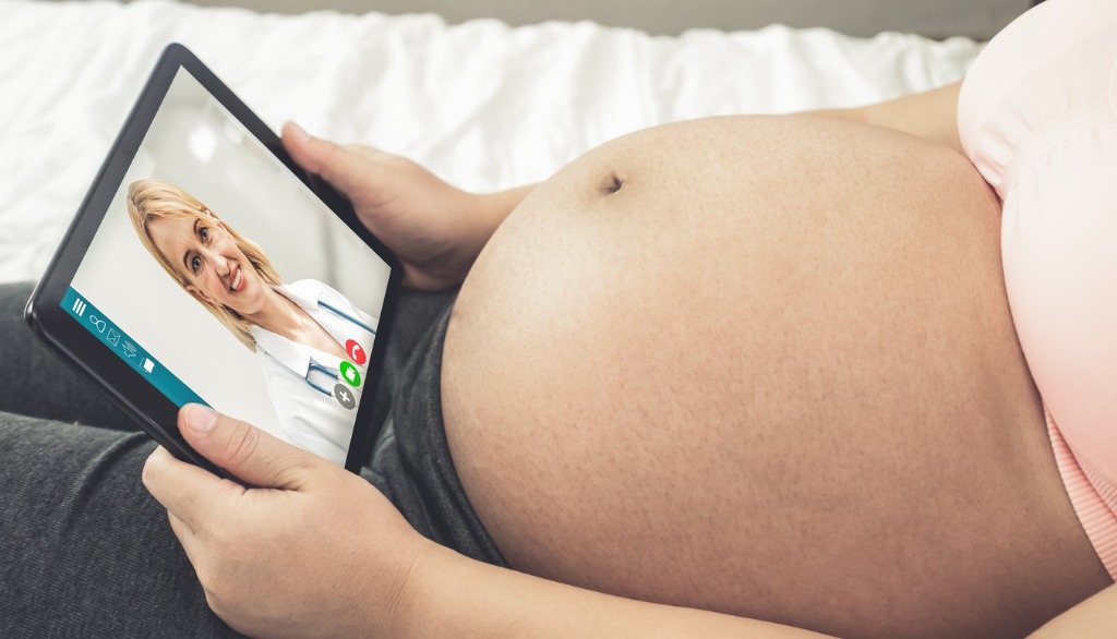 maternal health crisis pregnant women doing telehealth call